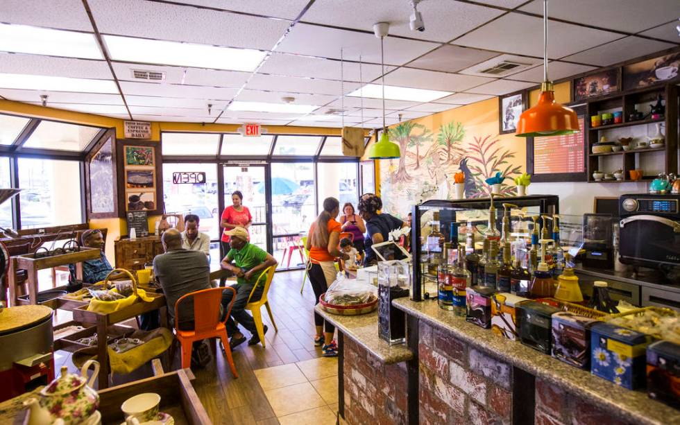 People enjoy drinks and food at Java Tree at Flamingo Road and Decatur Boulevard in Las Vegas o ...