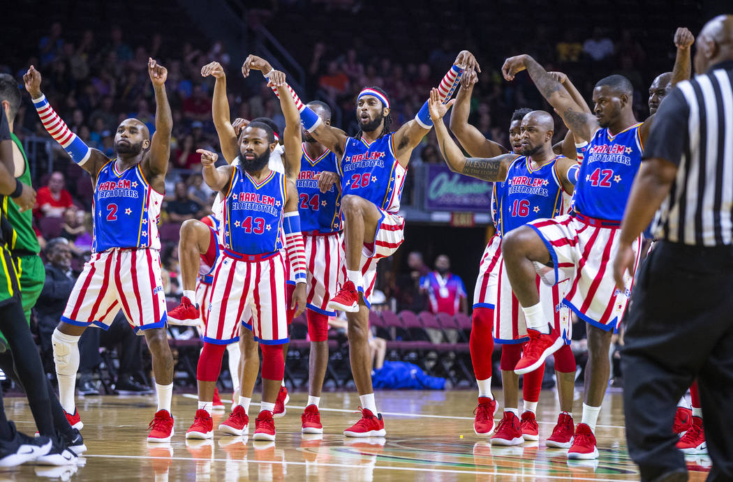 Harlem Globetrotters strike a "Karate Kid" pose versus the Washington Generals during ...