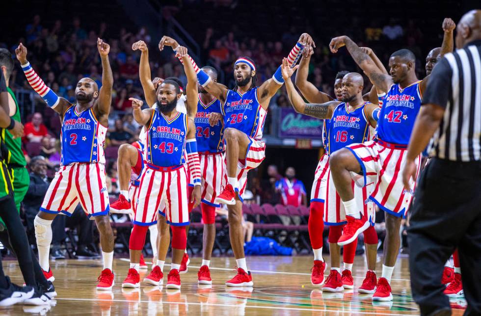 Harlem Globetrotters strike a "Karate Kid" pose versus the Washington Generals during ...