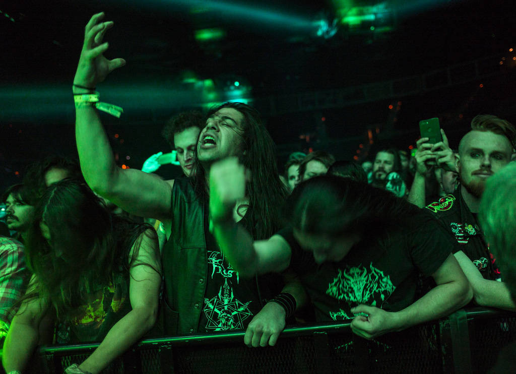 Fans react as Triumph of Death performs at the Mandalay Bay Events Center during the Psycho Las ...