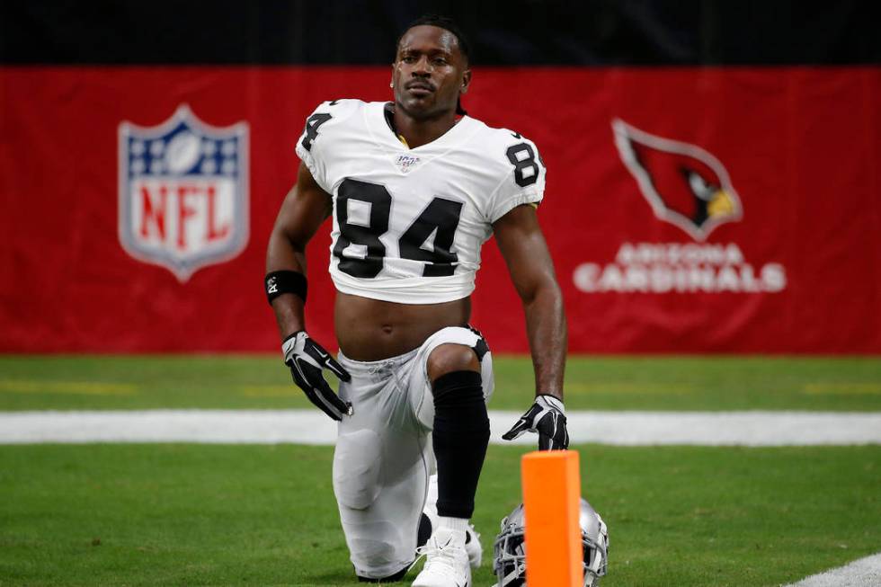 Oakland Raiders wide receiver Antonio Brown (84) warms up prior to an NFL football game against ...