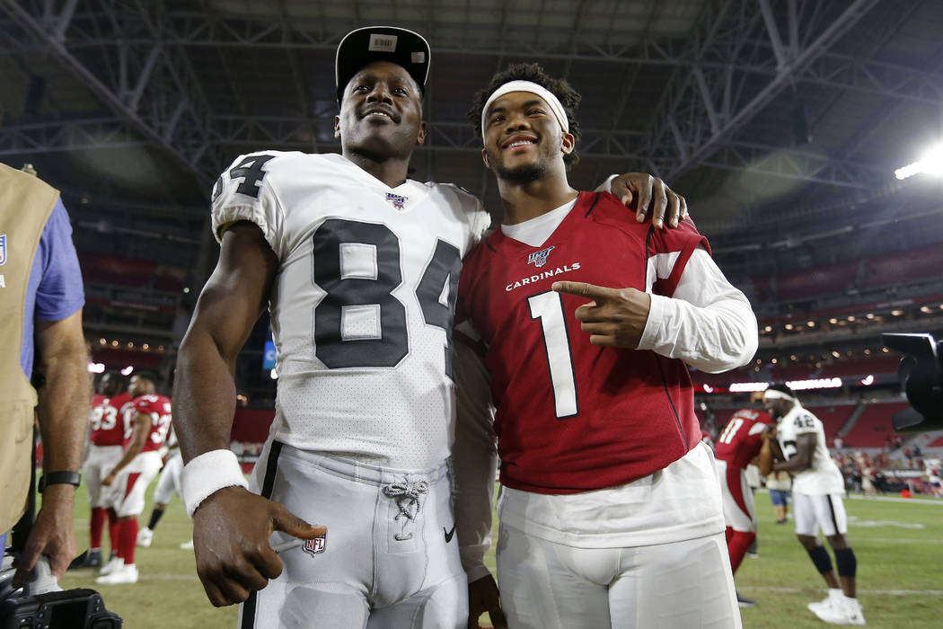 Arizona Cardinals quarterback Kyler Murray (1) and Oakland Raiders wide receiver Antonio Brown ...