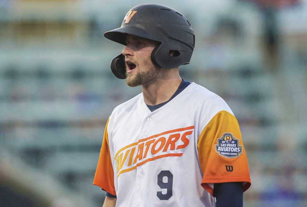 Las Vegas Aviators first baseman Seth Brown (9) pumps up his teammates after singling in the bo ...