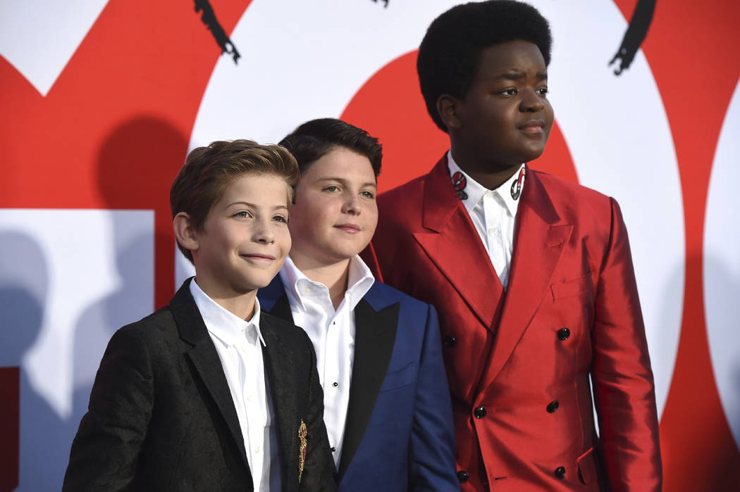 Jacob Tremblay, from left, Brady Noon and Keith L. Williams arrive at the premiere of "Goo ...