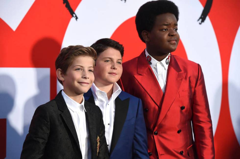 Jacob Tremblay, from left, Brady Noon and Keith L. Williams arrive at the premiere of "Goo ...