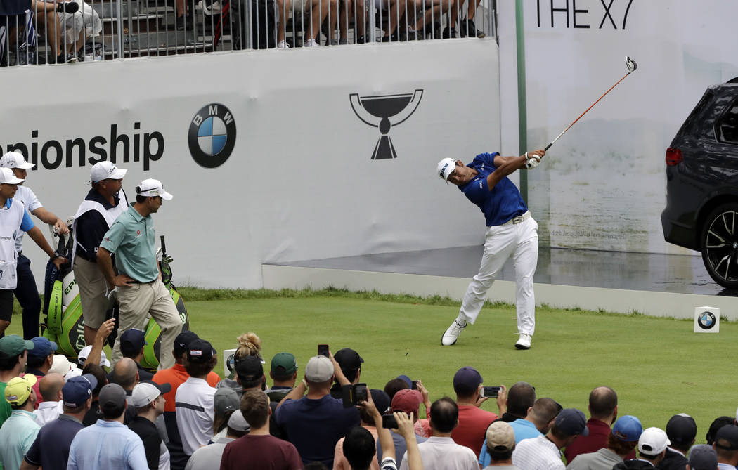 Hideki Matsuyama, of Japan, hits his tee shot on the first hole during the final round of the B ...