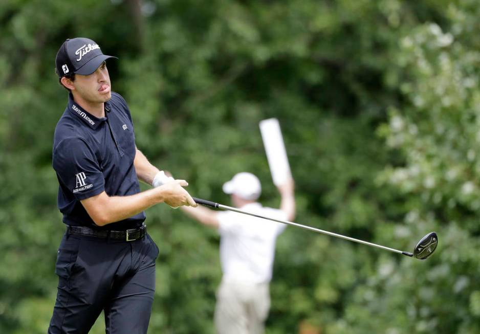 Patrick Cantlay watches his tee shot on the fifth hole during the final round of the BMW Champi ...