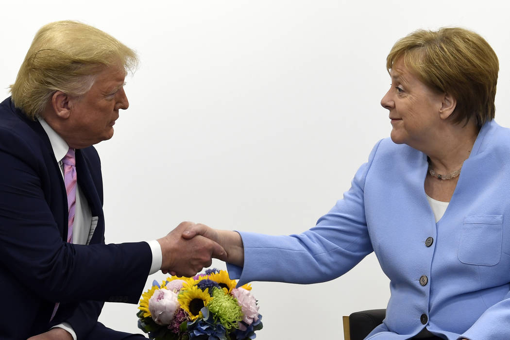 President Donald Trump meets with German Chancellor Angela Merkel on the sidelines of the G-20 ...