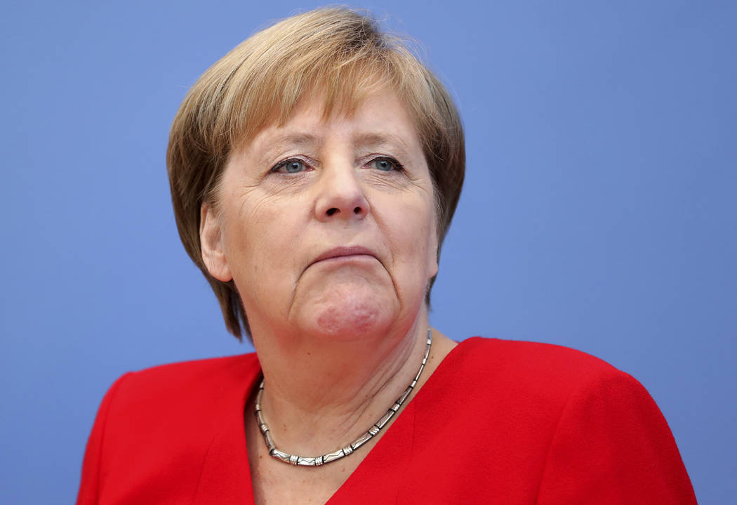 German Chancellor Angela Merkel attends her annual sommer press conference in Berlin, Germany, ...