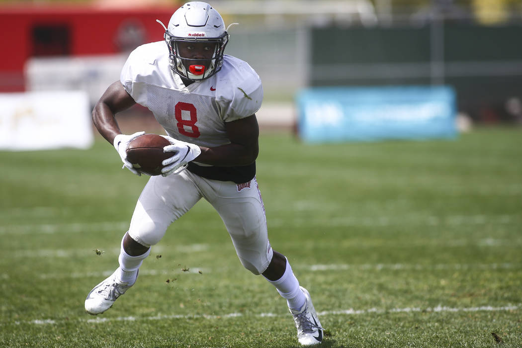 UNLV Rebels running back Charles Williams (8) runs the ball during the spring football game at ...