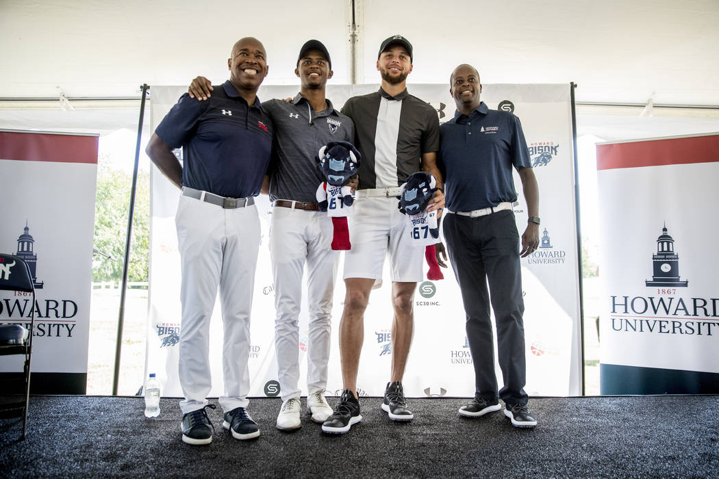 From left, Howard University Athletic Director Kery Davis, Howard student Otis Ferguson, Golden ...