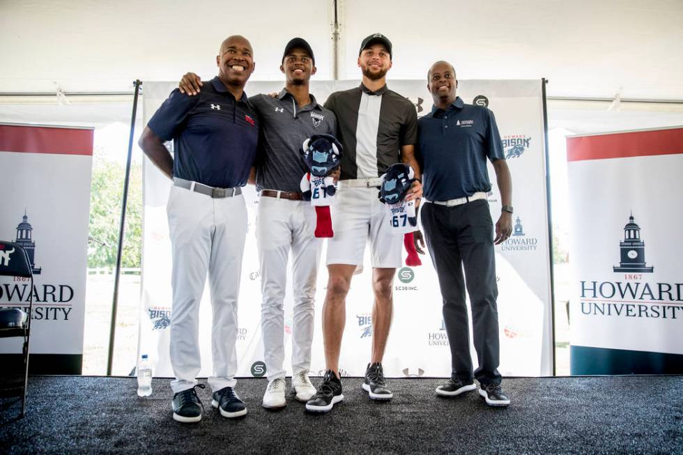 From left, Howard University Athletic Director Kery Davis, Howard student Otis Ferguson, Golden ...