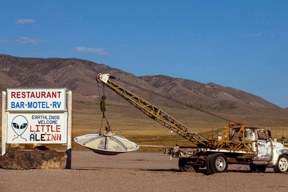 A spaceship hanging from a tow truck marks the entrance to the Little A'Le'Inn which is to be a ...