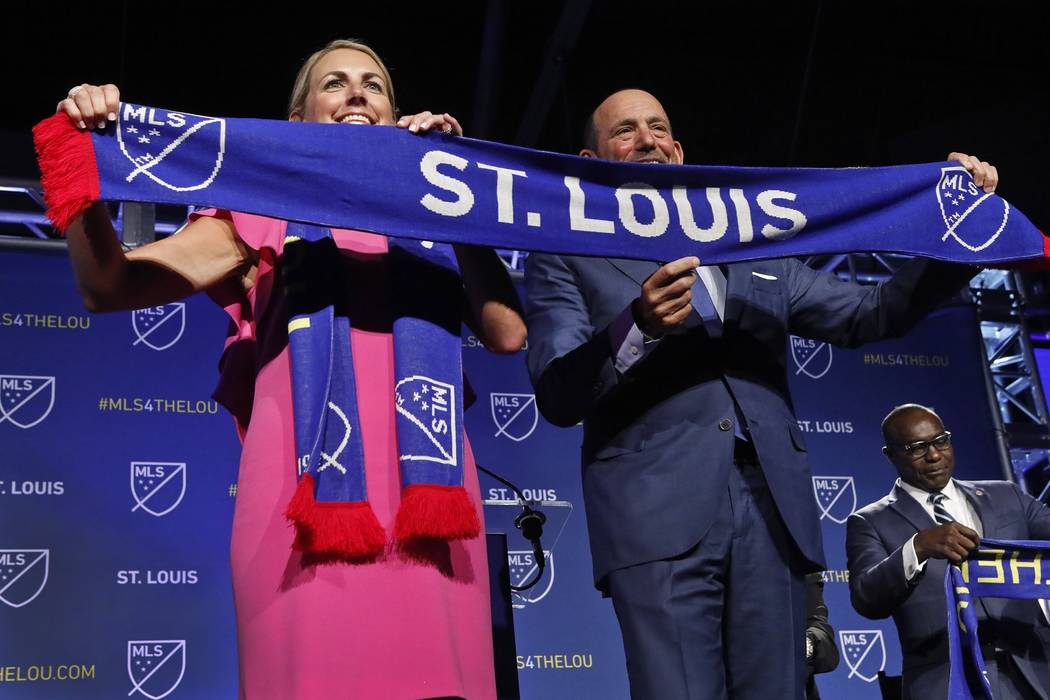 Carolyn Kindle Betz, a member of the ownership group of the new soccer franchise, and Major Lea ...