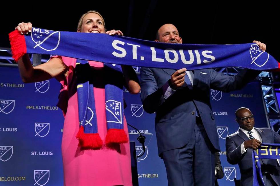 Carolyn Kindle Betz, a member of the ownership group of the new soccer franchise, and Major Lea ...