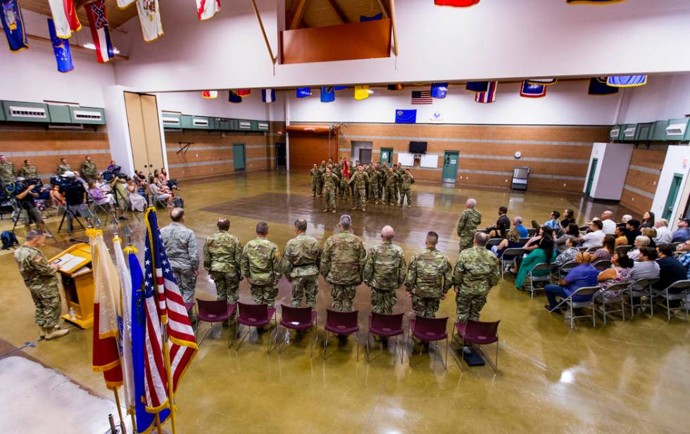 Soldiers with the Nevada Army Guard 3665th Explosive Ordnance Disposal Company are joined by fa ...