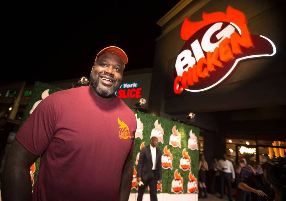 Shaquille O'Neal smiles during the grand opening celebration of Big Chicken, Shaq's fast-casual ...