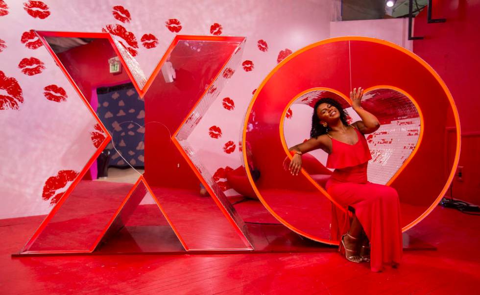 Avery Simone strikes a pose in the XO Room at the new Happy Place popup at Mandalay Bay on Wedn ...