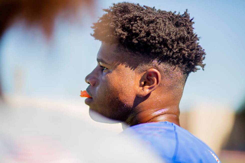 Bishop Gorman's outside linebacker Bryan Certain (24) watches a scrimmage during practice at Bi ...