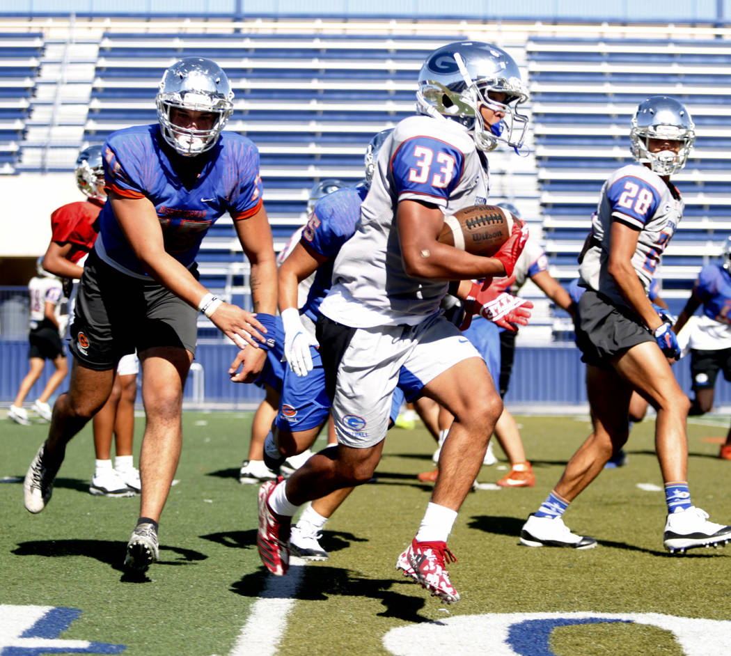 Bishop Gorman's running back Jahsai Shannon (33) participates in a drill during practice at Bis ...