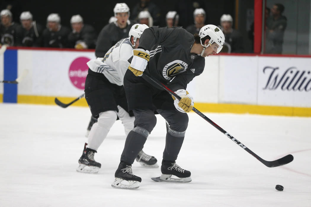 Vegas Golden Knights Nicolas Hague (14) looks to make a during a development camp scrimmage at ...