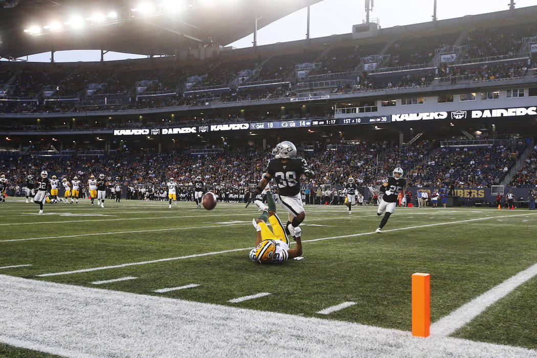 Green Bay Packers' Equanimeous St. Brown (19) misses the pass in the modified end zone as Oakla ...