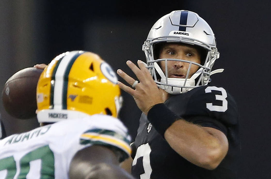 Oakland Raiders quarterback Nathan Peterman (3) throws a pass against the Green Bay Packers dur ...