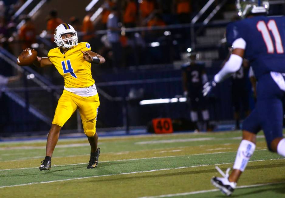 Orem's Kana'ipono Kahala-Giron (4) looks to pass during the second half of a football game at B ...