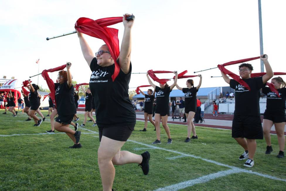 The Liberty High marching band perform during a football game against Chandler, Ariz., High Sch ...