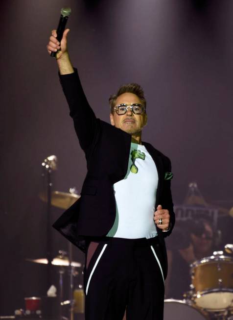 Actor Robert Downey Jr. addresses the crowd before the Rolling Stones concert at the Rose Bowl, ...