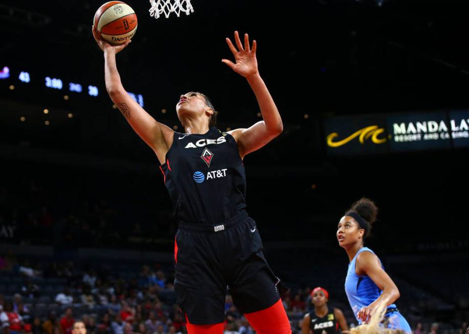 Las Vegas Aces center Liz Cambage goes to the basket against the Atlanta Dream during the first ...