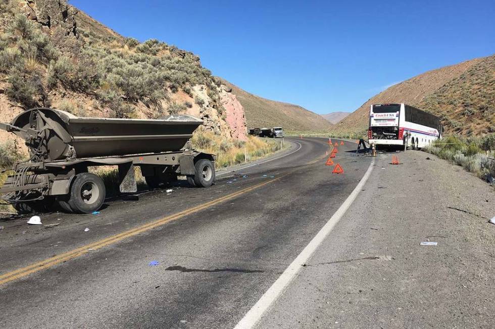 Two people were killed after a semitractor-trailer crashed head-on into a bus Saturday, Aug. 24 ...