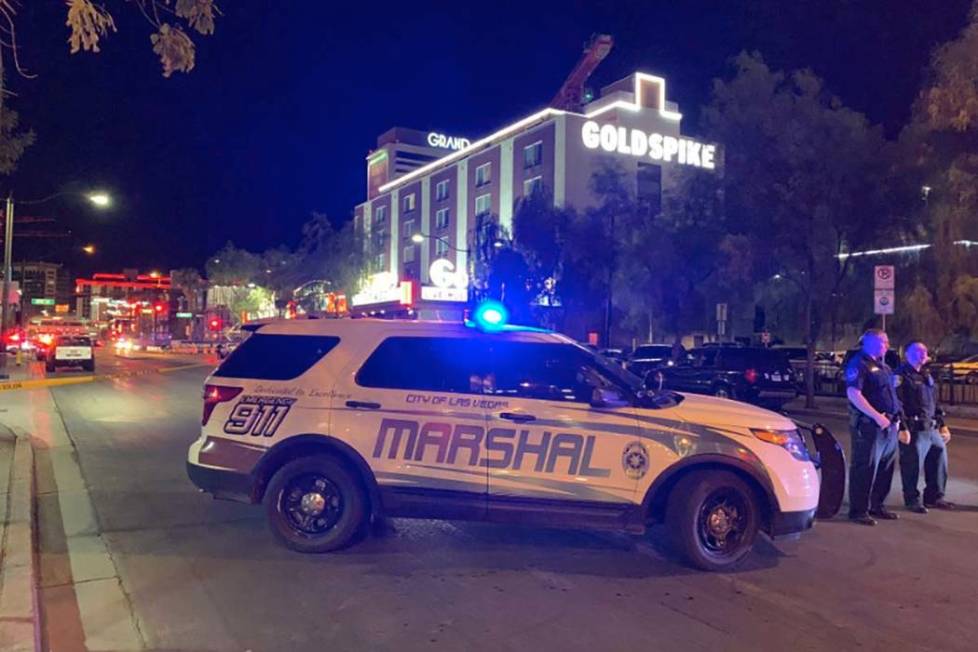 A large law enforcement presence is visible on Thursday, Aug. 22, 2019, in downtown Las Vegas, ...
