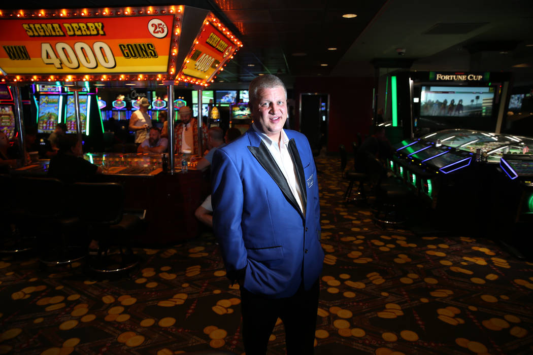 Derek Stevens, owner of the D Las Vegas hotel-casino, poses inside the casino floor in Las Vega ...