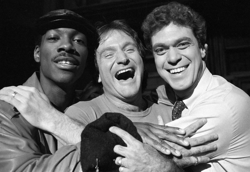 Robin Williams, center, takes time out from rehearsal at NBC's Saturday Night Live with cast me ...