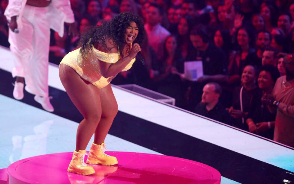 Lizzo performs a medley at the MTV Video Music Awards at the Prudential Center on Monday, Aug. ...