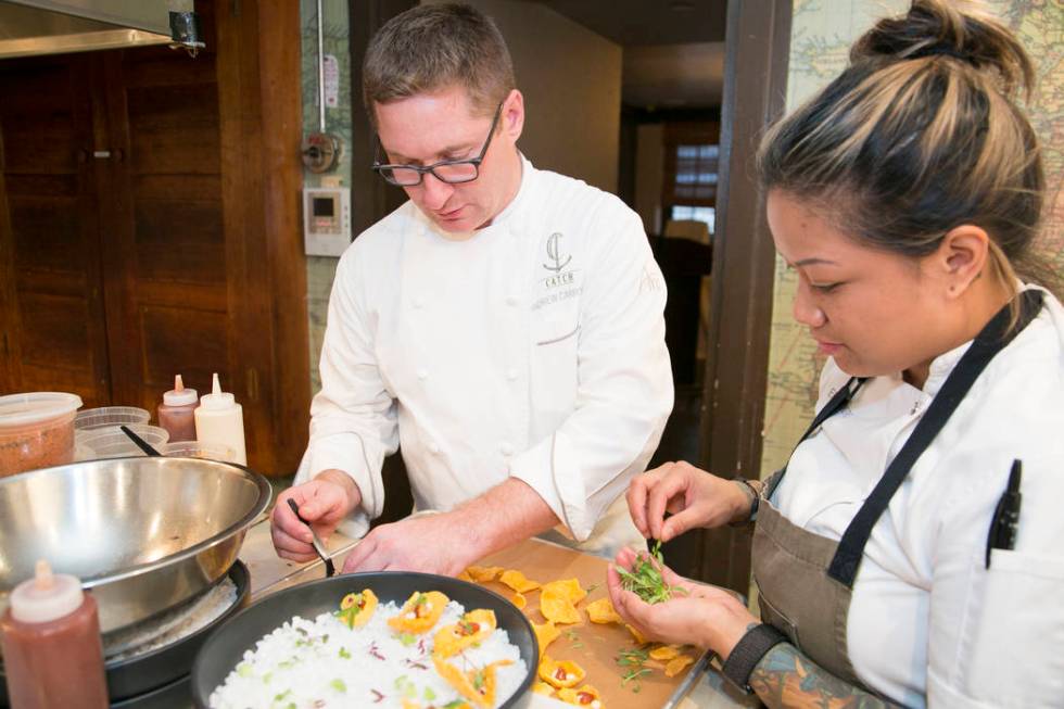 Photo by Rinah Oh Andrew Carroll preparing a dish at the James Beard House in New York City.