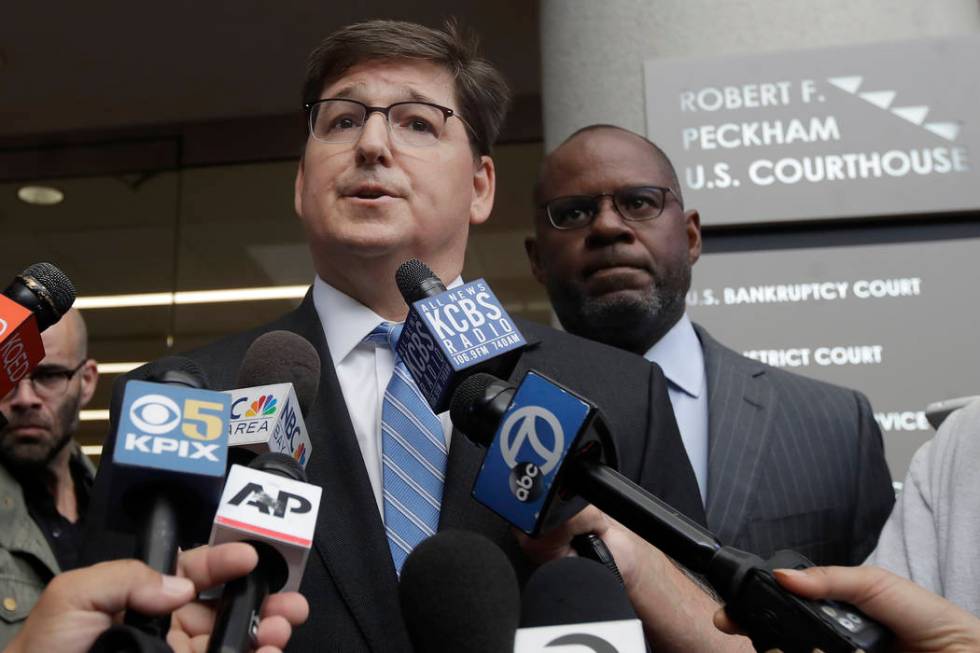 Attorneys Miles Ehrlich, left, and Ismail Ramsey, representing Anthony Levandowski, speak to re ...