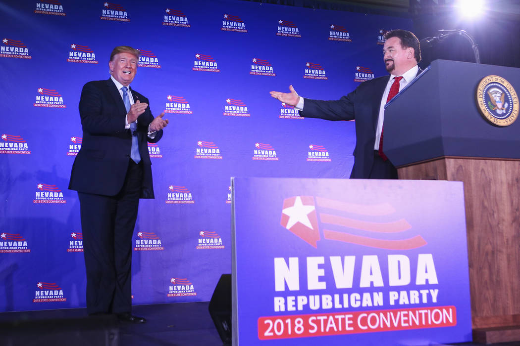 Donald Trump is introduced by Nevada Republican Party Chairman Michael McDonald during the keyn ...