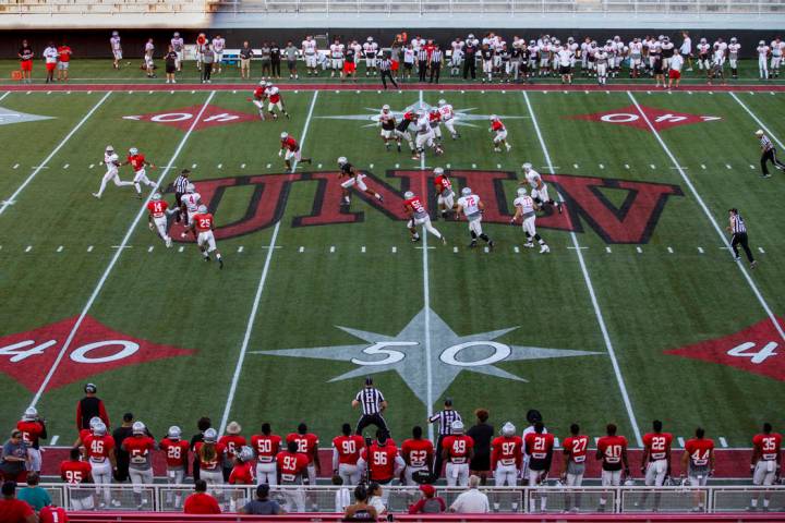 UNLV QB Armani Rogers (1) breaks free for a long run during their first major scrimmage of foot ...