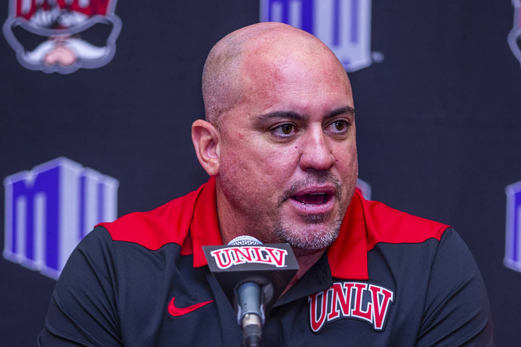 UNLV football head coach Tony Sanchez answers questions by media during a news conference on Mo ...