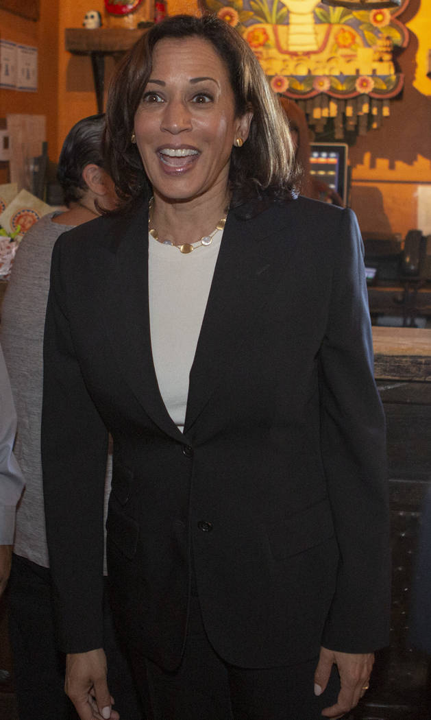 Democratic presidential candidate Sen. Kamala Harris, D-Calif., smiles as she walks into the Li ...