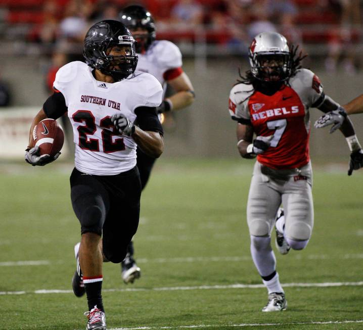 Southern Utah University's Erron Vonner, #22, returns an interception for a long touchdown agai ...