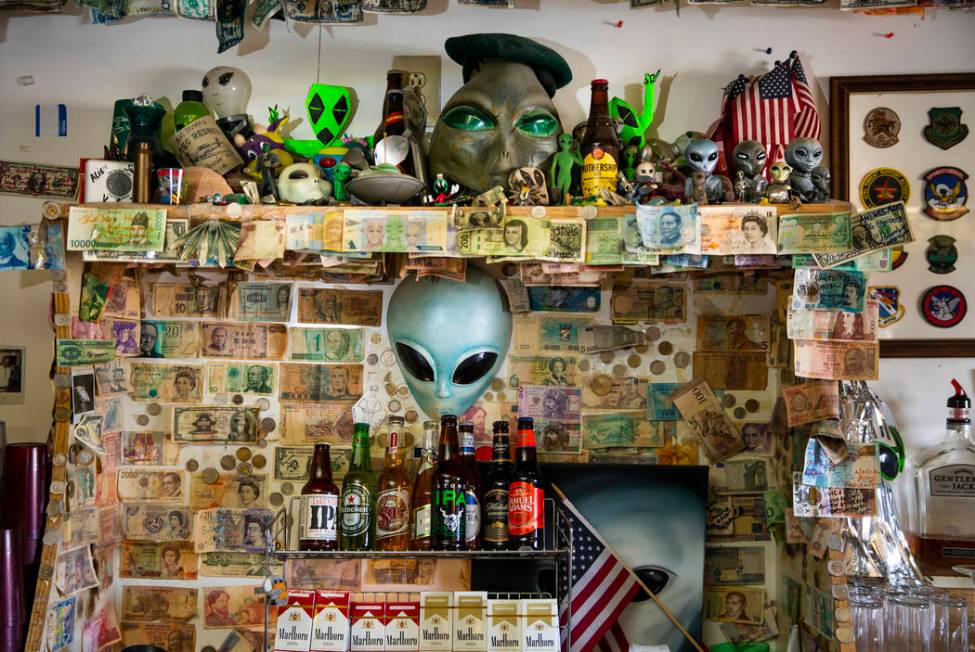 Alien memorabilia behind the bar and the restaurant at the Little A'Le'Inn in Rachel, which wil ...