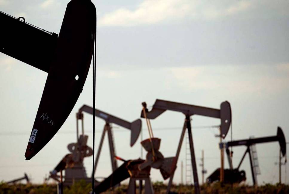 In an April 24, 2015, file photo, pumpjacks work in a field near Lovington, N.M. Oil industry ...