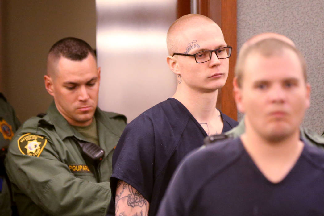 Devin “Soup” Campbell, center, and Gary "Bro Bro" Kingland, right, appear in court at the R ...