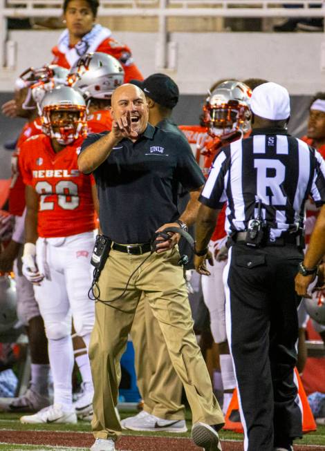 UNLV Rebels head coach Tony Sanchez argues with a referee versus Southern Utah during the firs ...