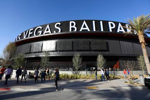 Fans line up to enter the Las Vegas Ballpark for the Las Vegas Aviators' home opener in Downtow ...
