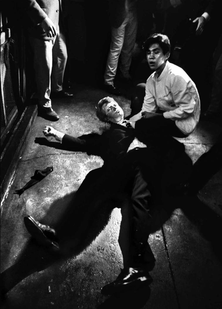 Sen. Robert F. Kennedy lies mortally wounded on the floor of a pantry at the Ambassador Hotel a ...