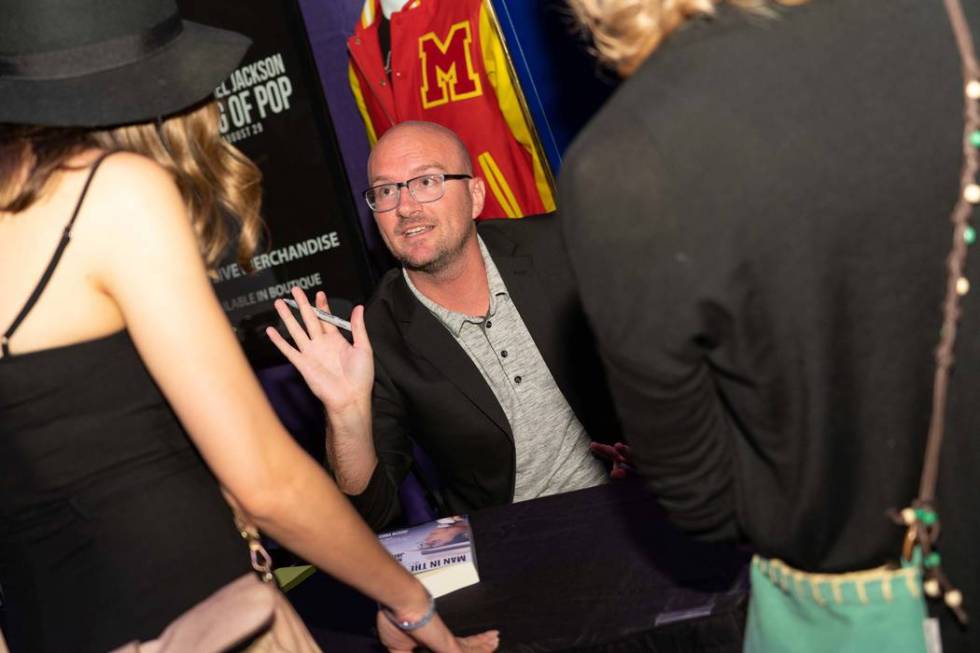 Michael Jackson biographer Joe Vogel is shown at a book-signing at Jackson's birthday celebrati ...